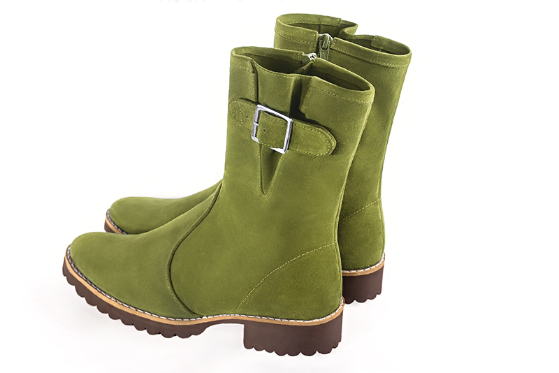 Pistachio green women's ankle boots with buckles on the sides. Round toe. Flat rubber soles. Rear view - Florence KOOIJMAN